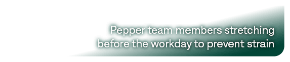 Pepper team members stretching before the workday to prevent strain