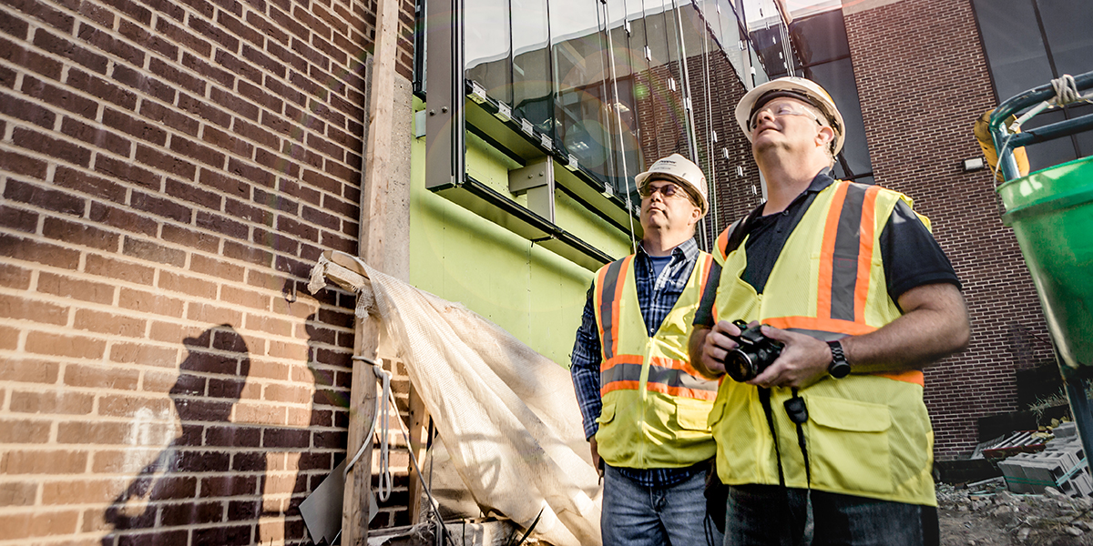 Inspecting-facade-before-demo