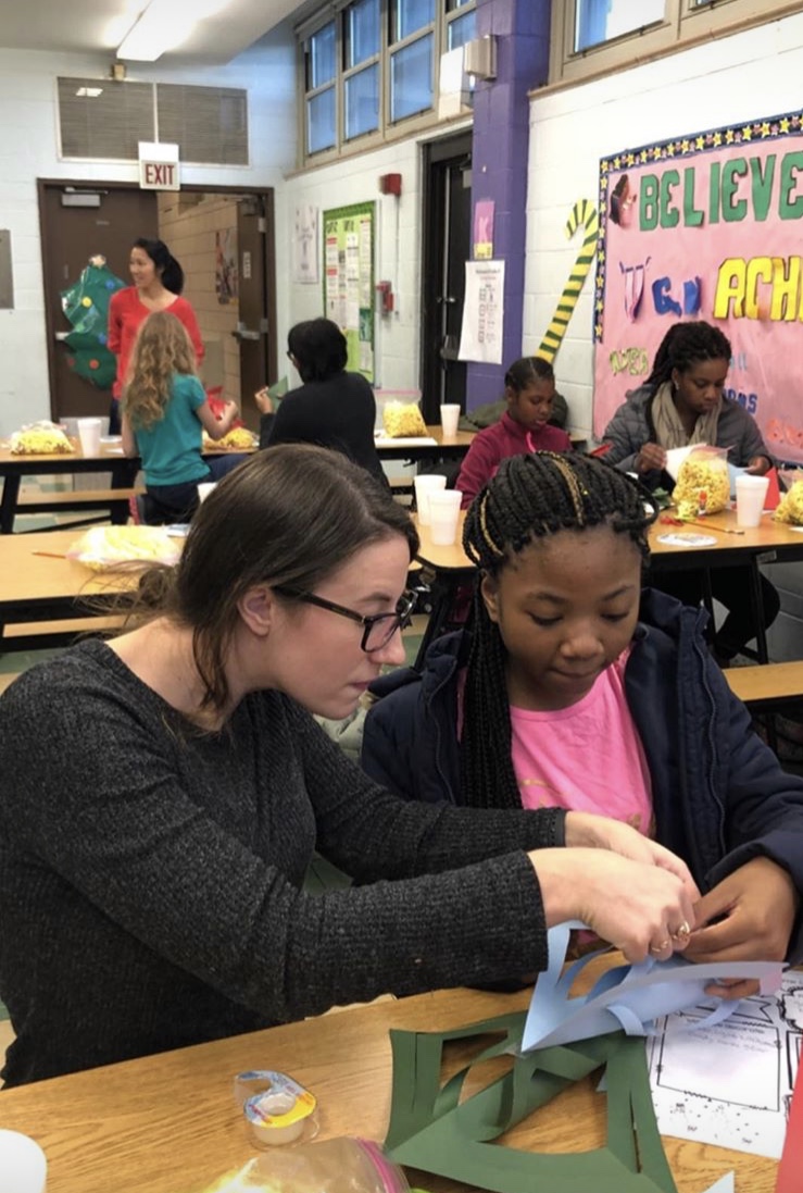 Holiday-volunteers-at- Genevieve-Melody-STEM-School