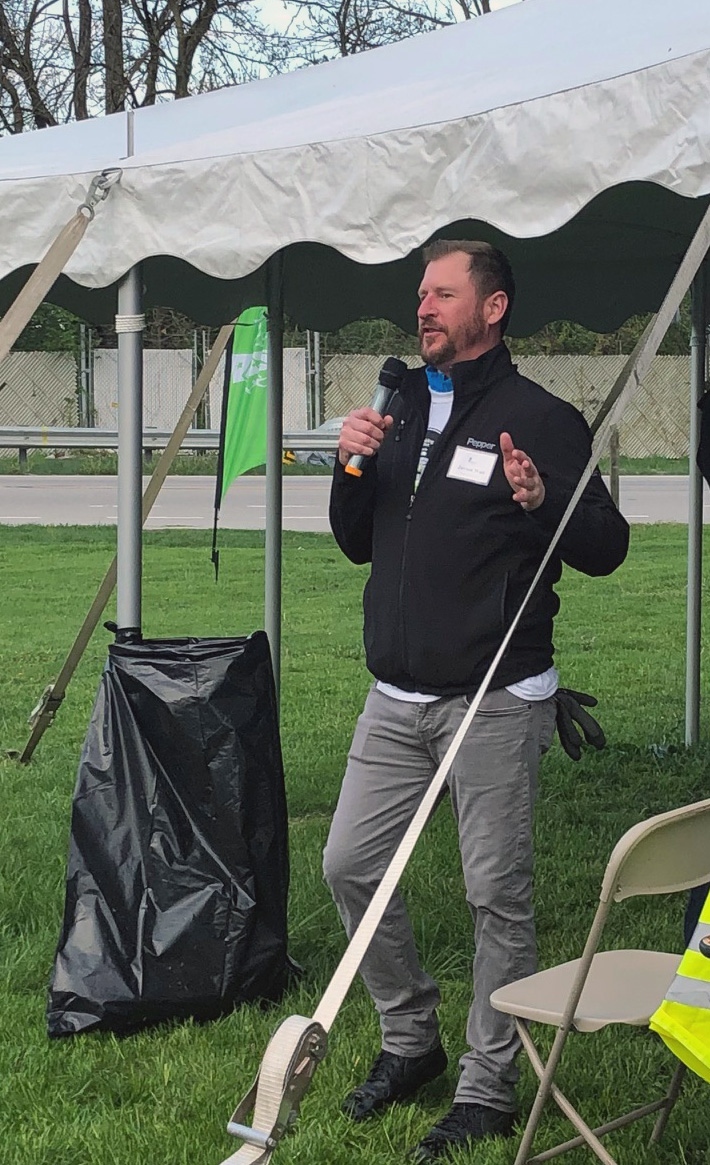 Jayson Watt, Pepper Indiana quality manager and Rebuilding Together board president, addresses Rebuilding Together volunteers