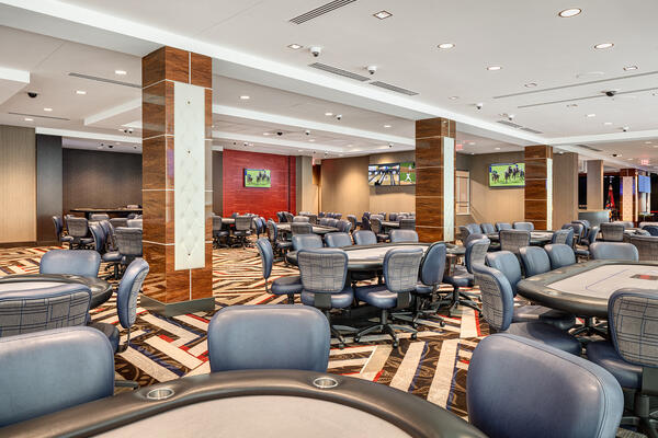 Dedicated poker room at Grand Victoria Casino with custom furnishings, gaming tables, and upgraded interior finishes.