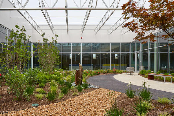 The courtyard in the center of the building provides outdoor break space.