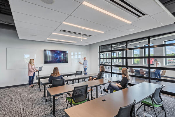 16-foot-garage doors open to expand the office into outside space