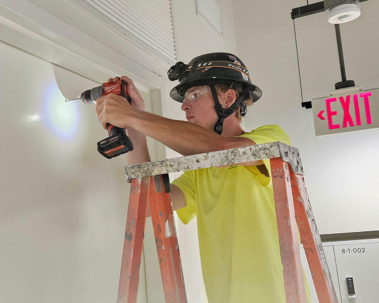 Construction Worker Drilling