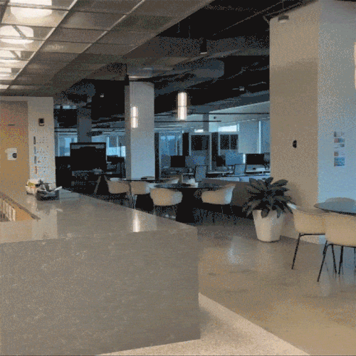animated gif of person walking through office, activating motion detecting lights